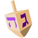 A spinning dreidel. A toy traditionally associated with Hannukkah.