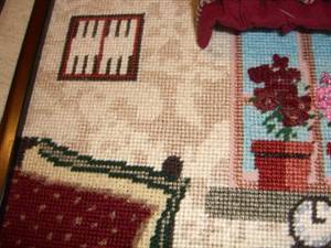 From guest bedroom, detail of pillow, wallpaper, backgammon board.