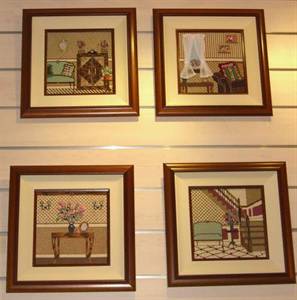 A customer completed four matching pieces from the Home Sweet Home set and chose beautiful mahogany frames. They are pictured here hanging on the wall of the finishing shop.